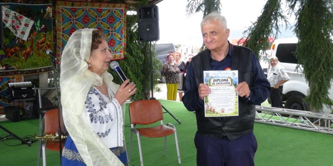 Din suflet pentru satul romanesc: Am primit cu profunda emotie Diploma de Excelenta pe scena Festivalului „Ravasitul Oilor” de la Runcu